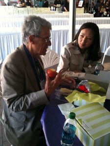 Tom Hall GHEC Executive Director Speaks with Student at CUGH10